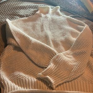 Turtleneck cream sweater